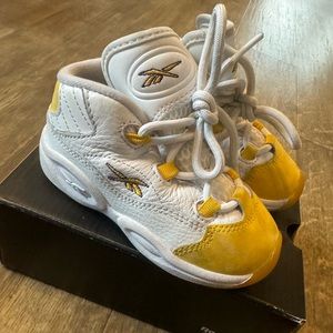 Reebok question mid toddlers in the color yellow and white size 7C.